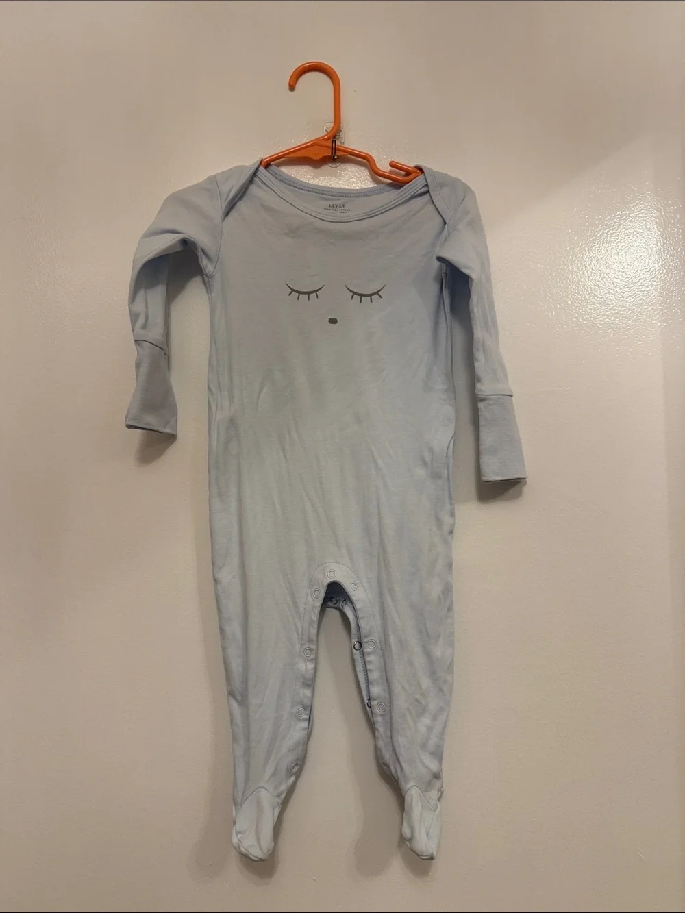 Lively Light Blue Footed Baby One-Piece with Sleepy Face